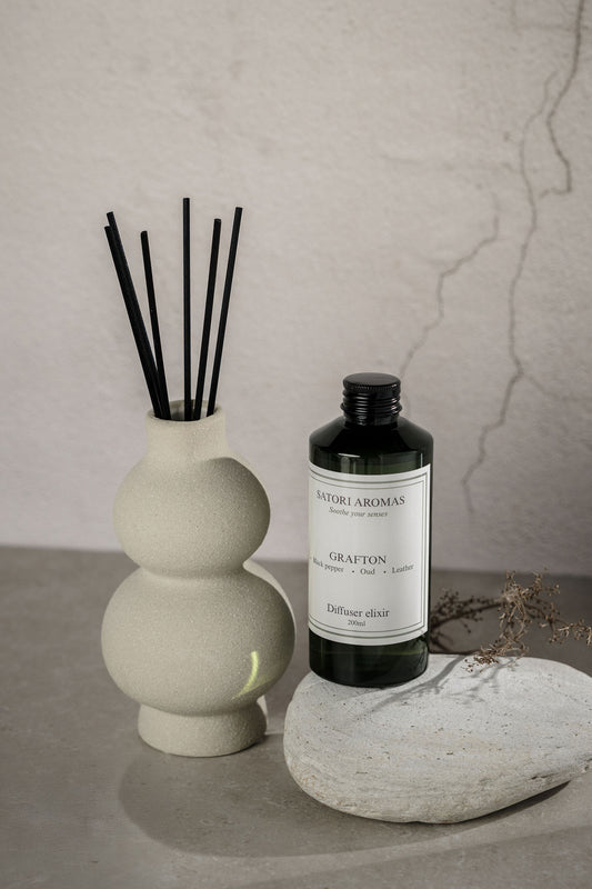 GRAFTON refillable reed diffuser in concrete vase with masculine leather and oud fragrance by Satori Aromas