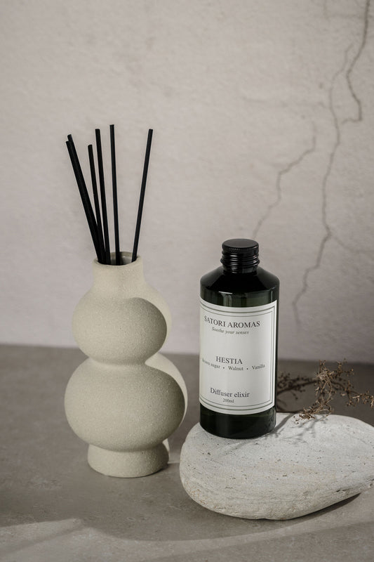 HESTIA refillable reed diffuser in concrete vase with caramelized pineapple fragrance by Satori Aromas